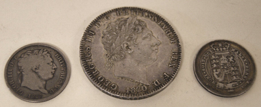 George III silver Crown, 1820. George III silver Shilling, 1817 and George IIII silver Shilling,