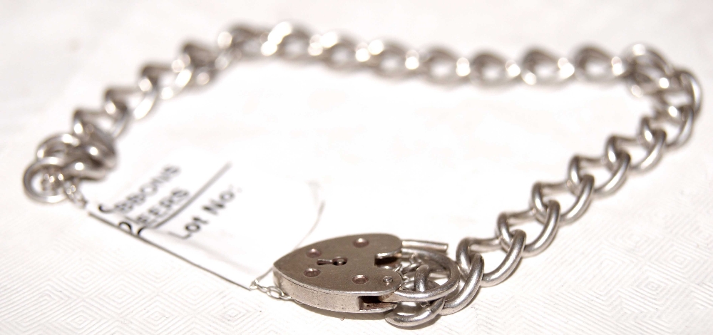 Silver hallmarked padlock ladies bracelet. Approximate weight 15g.