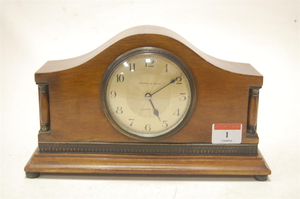 A mahogany dome top mantel clock retailed by Kendal & Dent of London, circa 1920
