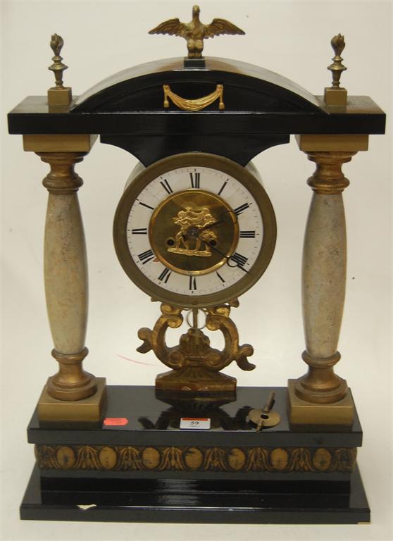 A French Empire style portico mantel clock