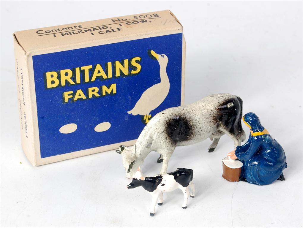 Britains, farm series set 5008 comprising of 1 milkmaid at work, 1 standing cow and 1 standing calf,