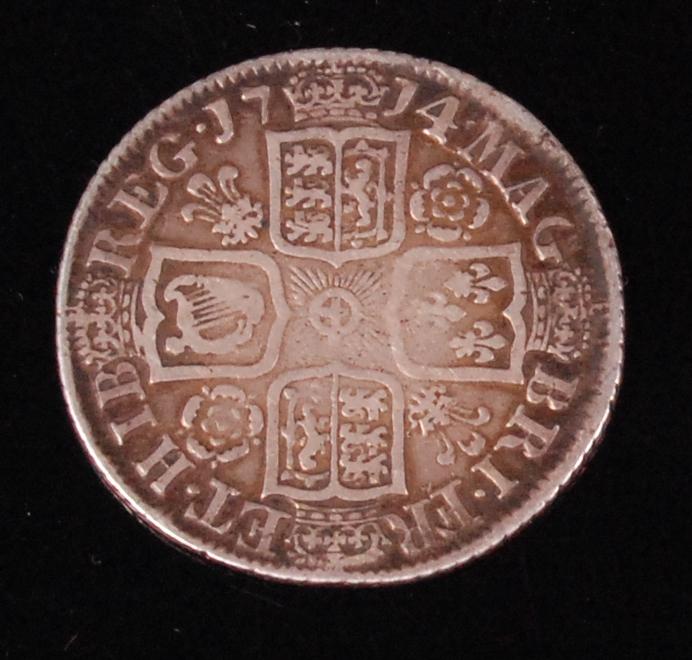 Great Britain, 1714 shilling, Queen Anne draped bust. rev. Crowned cruciform shields, roses and - Image 2 of 2