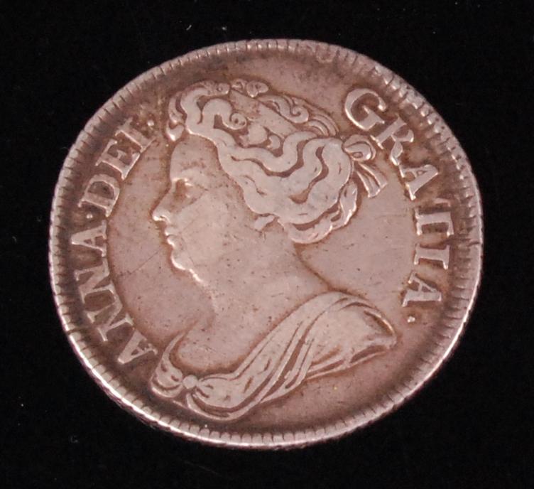 Great Britain, 1714 shilling, Queen Anne draped bust. rev. Crowned cruciform shields, roses and