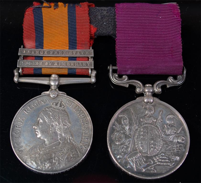 A Queens South Africa (1899-1902) medal with Orange Free State and Relief of Kimberley clasps,