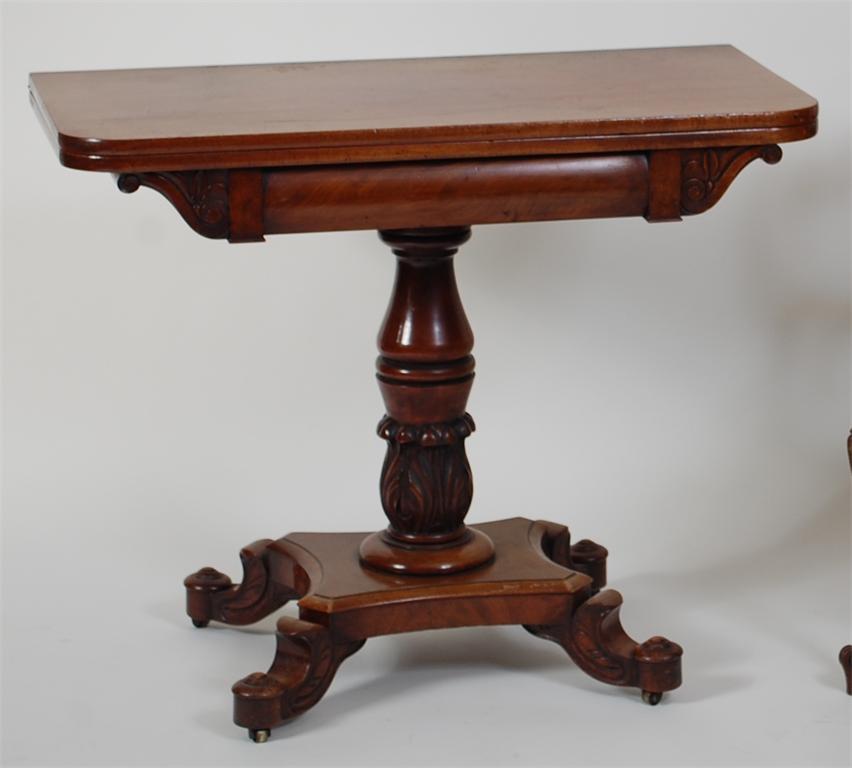 A William IV mahogany pedestal tea table, having fold-over top and raised on a quatraform base, w.