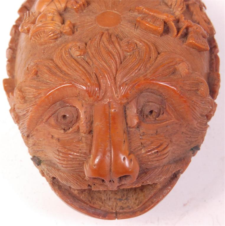 An 18th century finely carved coquilla nut, in the form of a grotesque mask with open mouth, the - Image 4 of 4