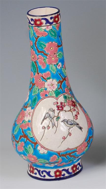 A Longwy faience pottery vase, of pear shape, enamel decorated in the Chinese taste, with opposing