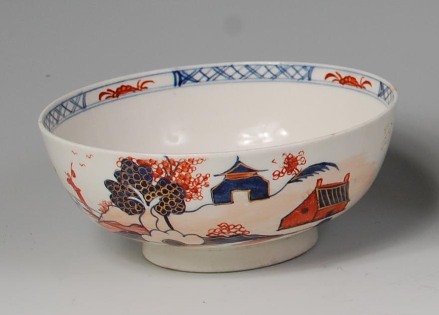 An 18th century Lowestoft porcelain slop-bowl, decorated in the Imari palette with chinoiserie
