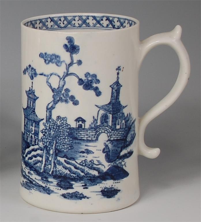 An 18th century Lowestoft porcelain tankard, underglaze blue decorated with a chinoiserie landscape, - Image 2 of 2