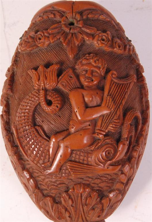 An 18th century finely carved coquilla nut, in the form of a grotesque mask with open mouth, the - Image 2 of 4