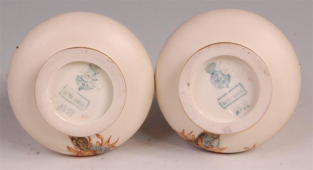 A pair of late 19th century Royal Worcester porcelain twin handled vases, enamel decorated in the - Image 3 of 3