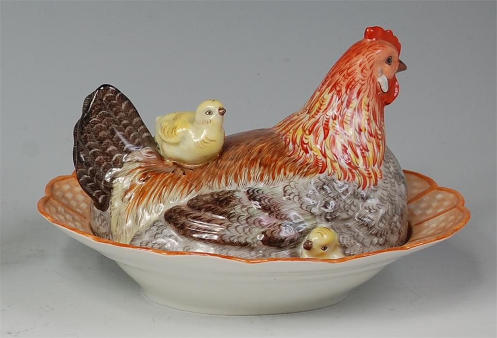 # A Dresden porcelain egg-crock, in the form of a nesting hen with chicks, decorated in bright - Image 2 of 2