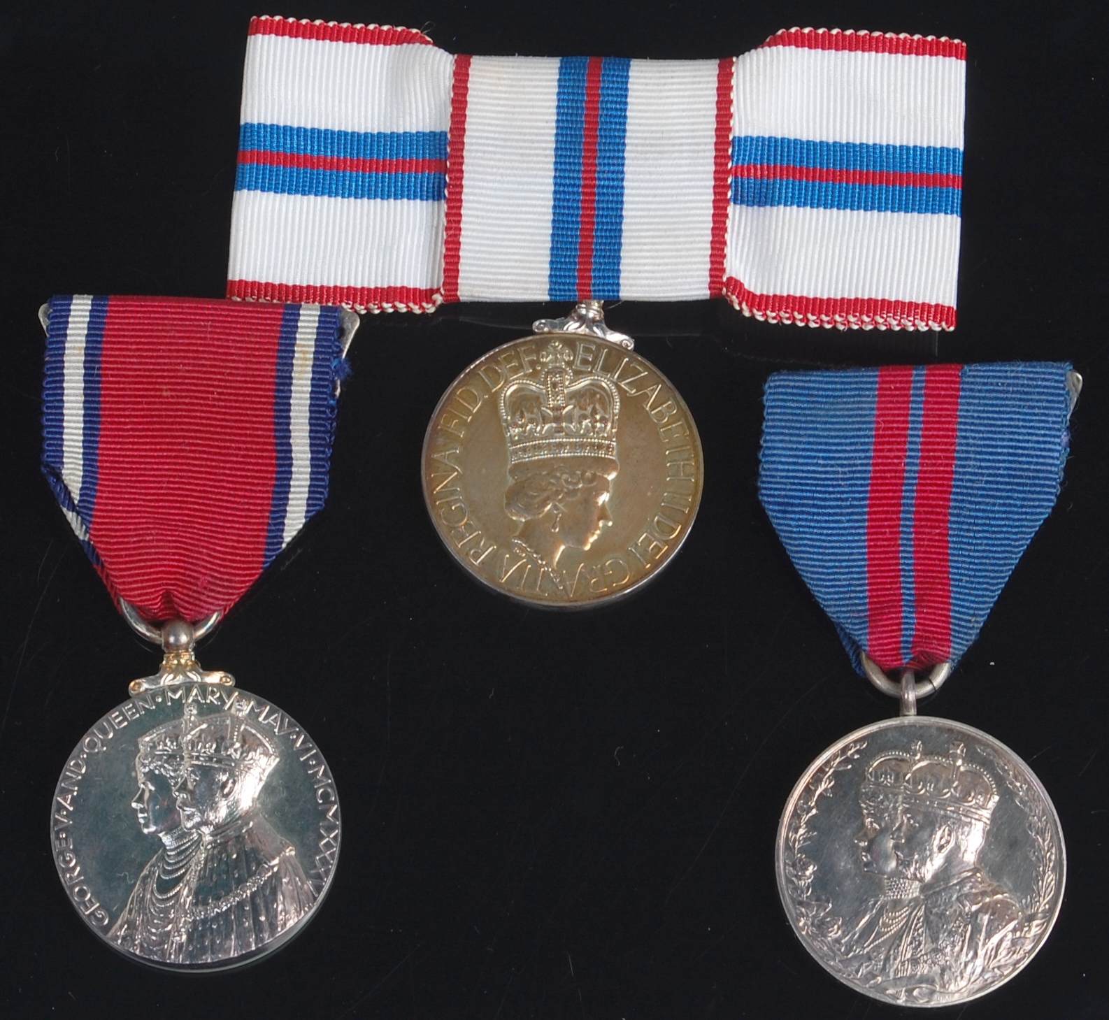 A Queen Elizabeth II 1952-77 silver jubilee medal, boxed, together with Geo. V 1911 Coronation and