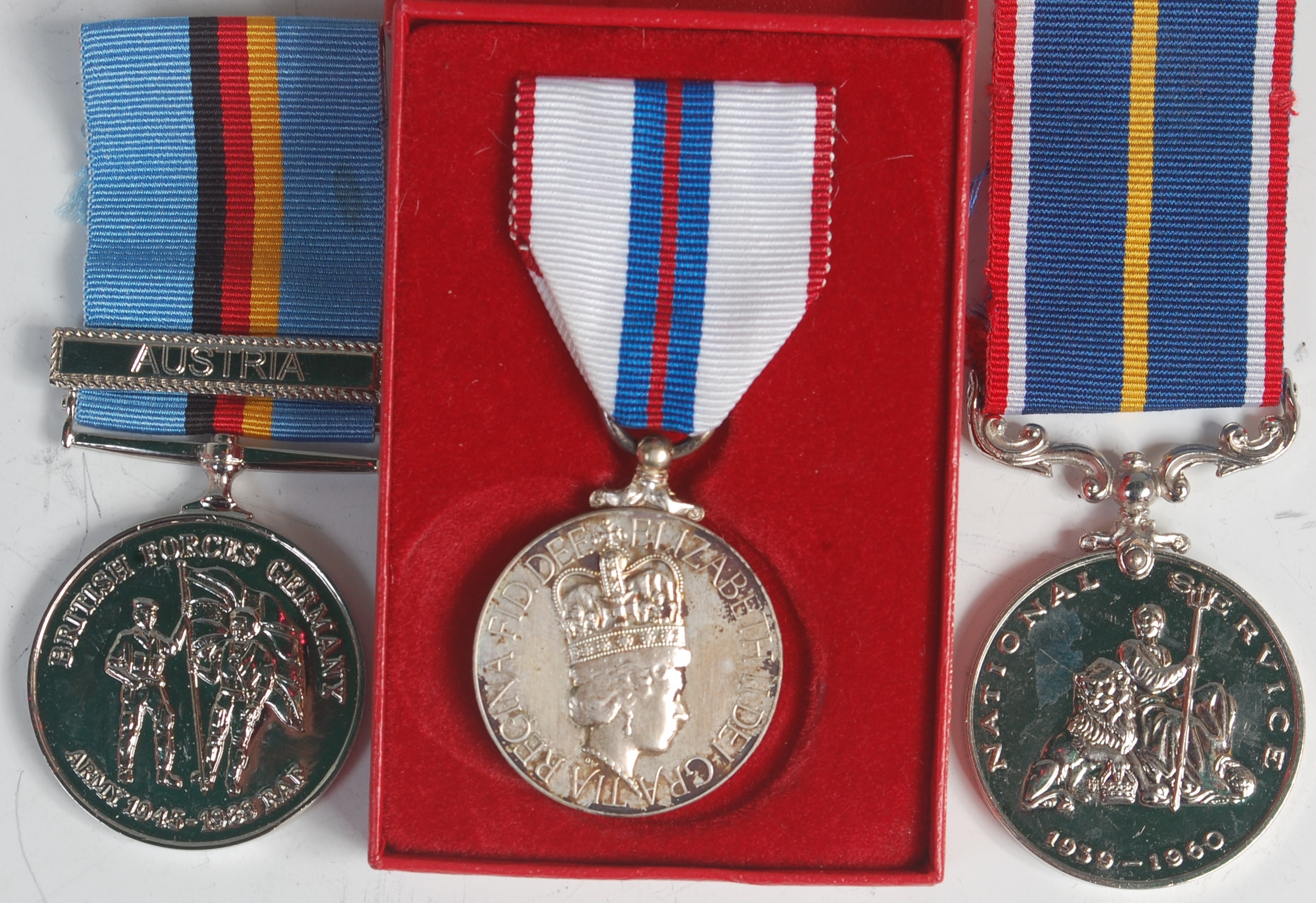 An Elizabeth II 1952-1977 Silver jubilee medal, awarded to Angus Wilson, boxed with supporting