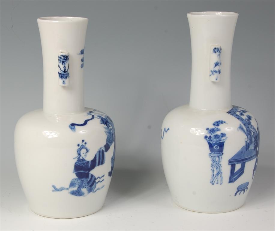 A pair of Chinese Republic period bottle vases, each underglaze blue decorated with ceremonial
