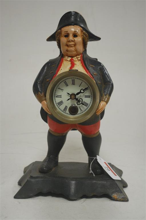 A reproduction cast and painted metal novelty clock in the form of a standing sailor (cased)