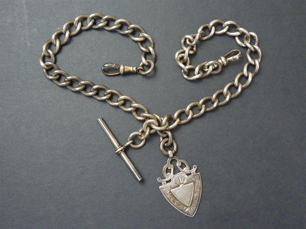 A Victorian silver double watch chain with T-bar, swivels and fob, 70g