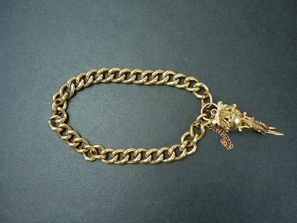 A 9ct gold curb link bracelet with fancy bauble clasp, 13.4g