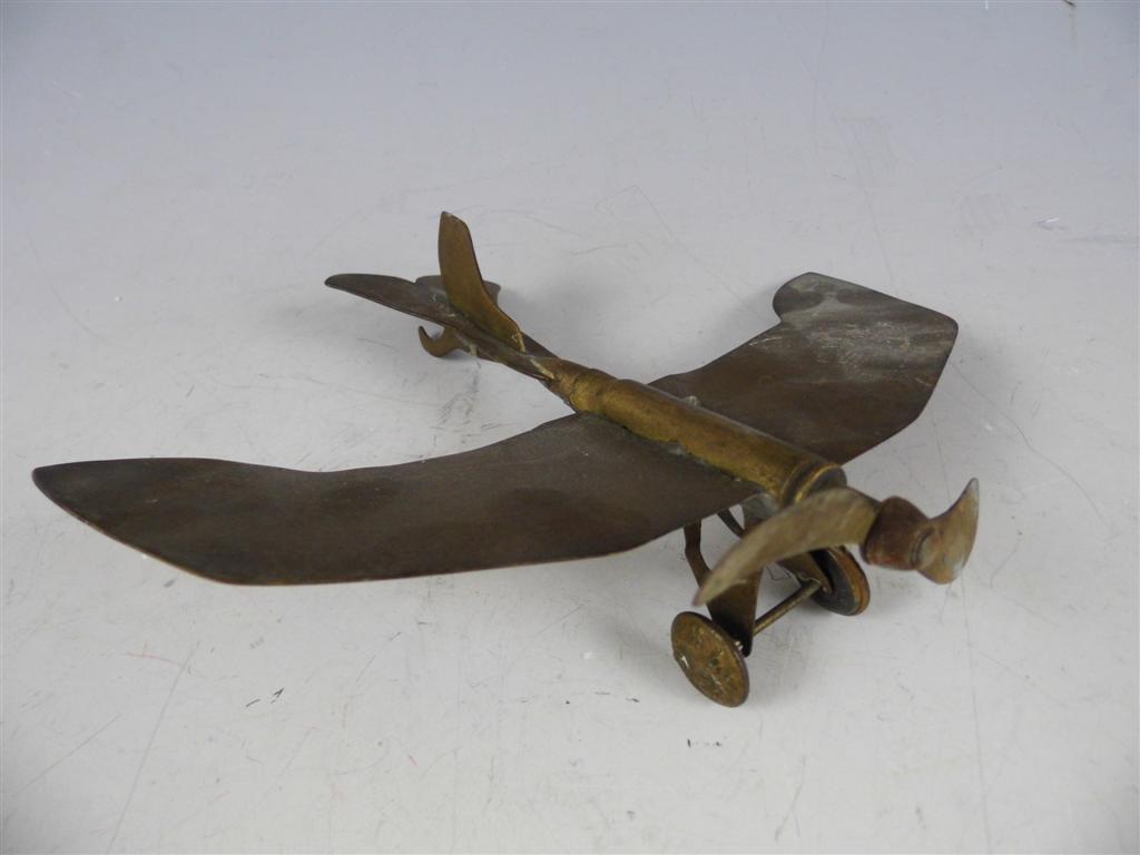 A First World War trench art model of an Imperial German Taube monoplane, 15.5 cm long