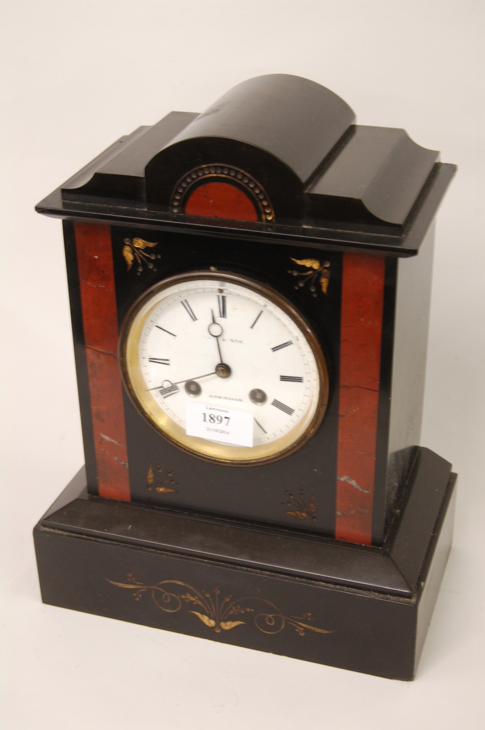 19th Century black slate and rouge marble mantel clock having circular enamel dial with Roman