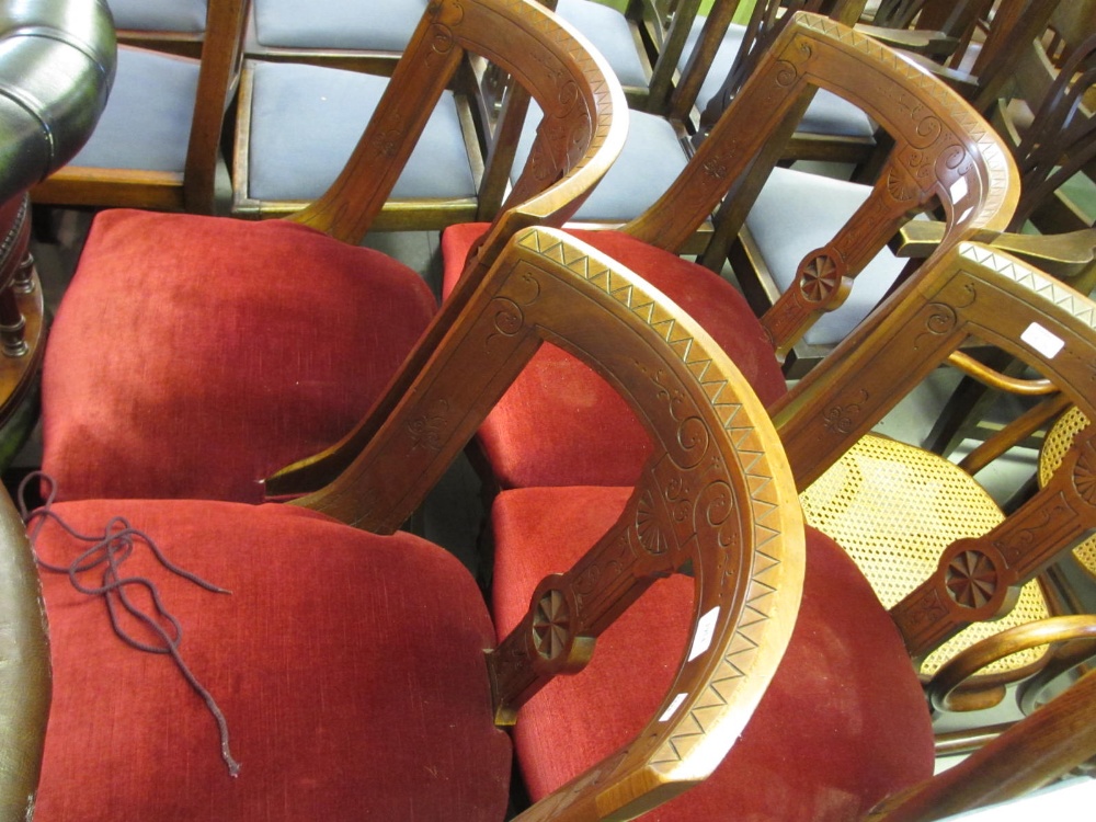 Set of four late 19th Century Arts and Crafts walnut dining chairs with red velvet overstuffed