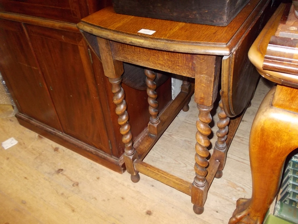 Early 20th Century oak oval gate leg table on barley twist supports