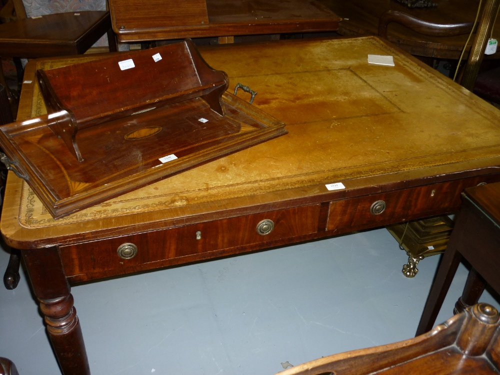 Late Georgian rectangular mahogany library table the leather insert top above four frieze drawers