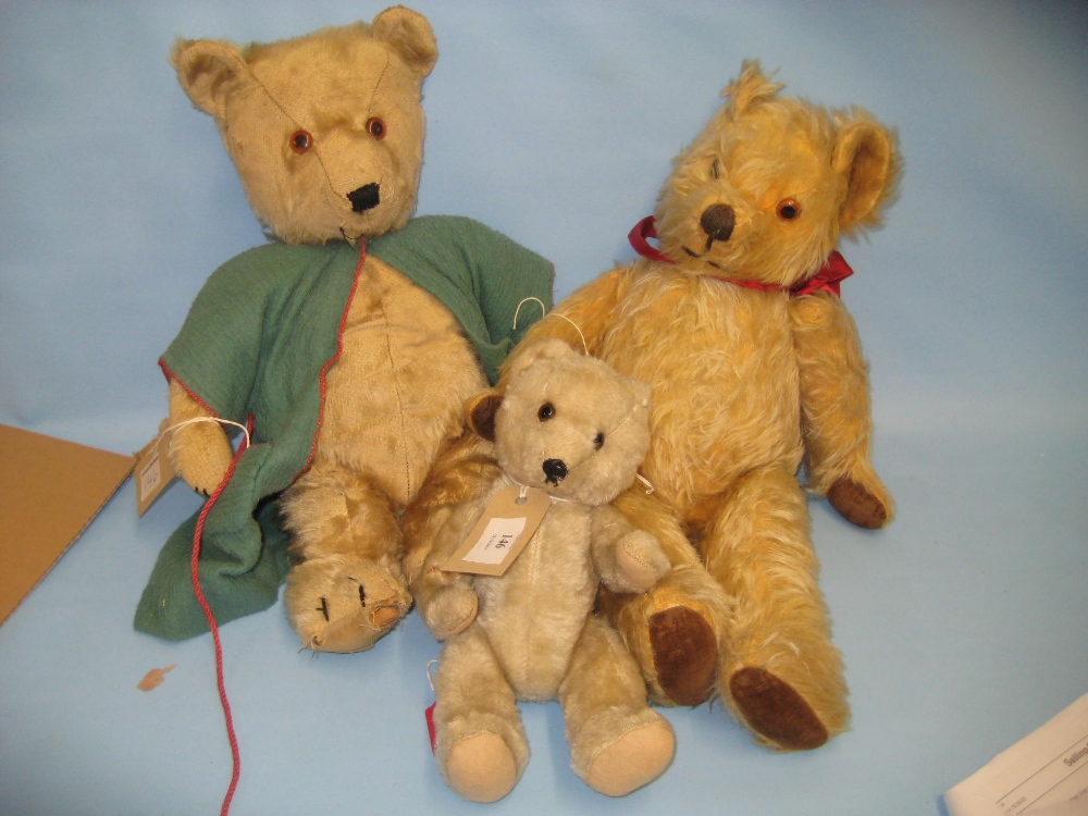 Group of three articulated plush covered teddy bears