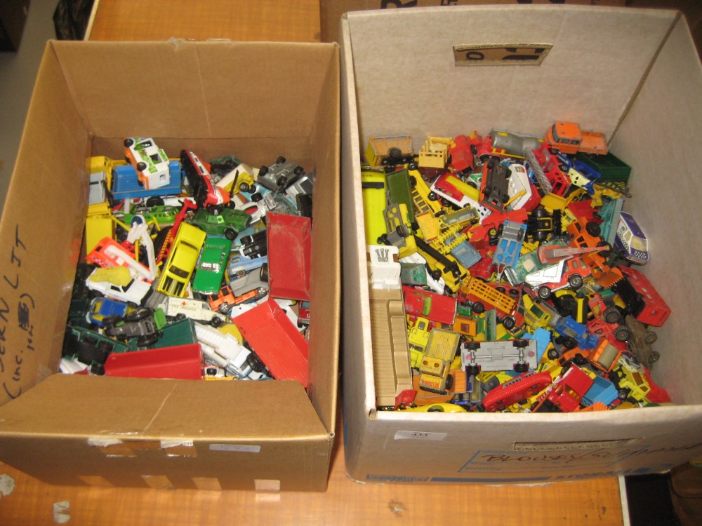 Three boxes containing a quantity of various Matchbox and other die-cast model vehicles