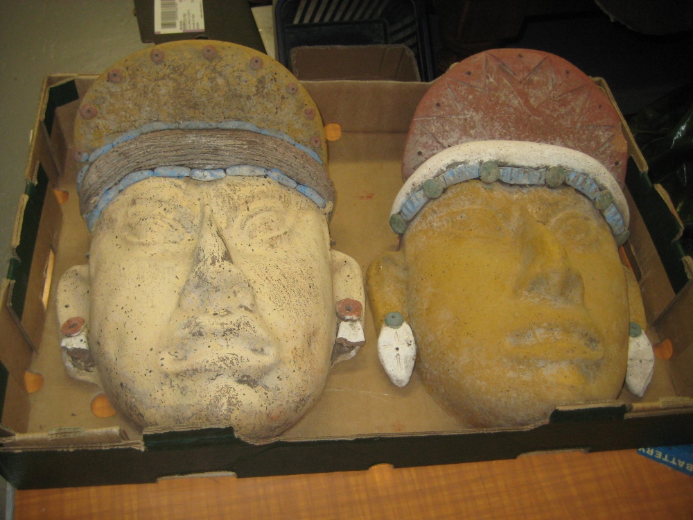 Two large native South American terracotta wall masks