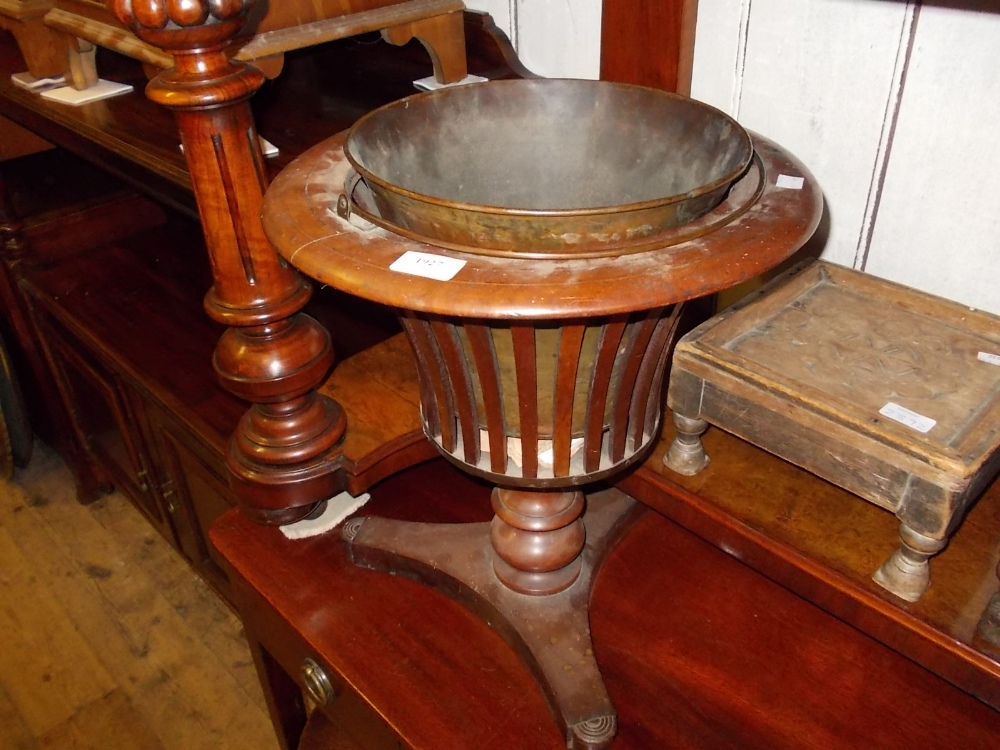 George III mahogany and line inlaid jardiniere with brass liner, the slatted bowl above a turned