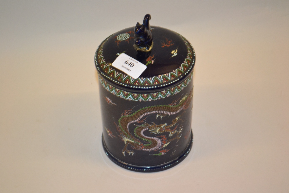 Japanese Satsuma jar and cover mounted with a figure of a squirrel, the body decorated with a dragon