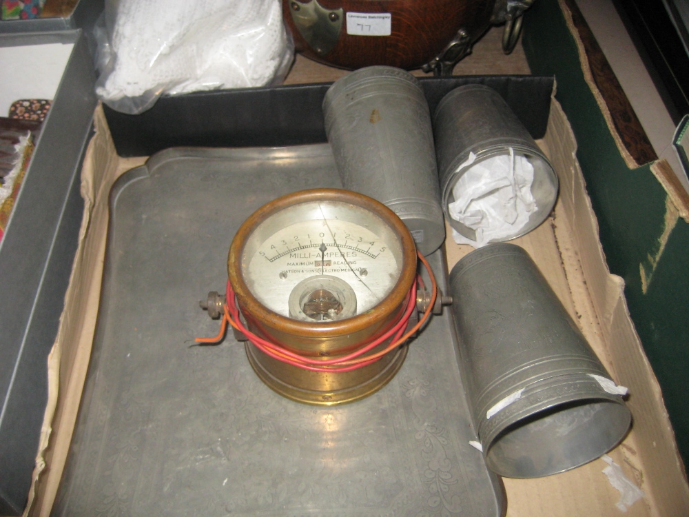 Eastern engraved pewter tray with beakers and a gilt brass cased amp meter