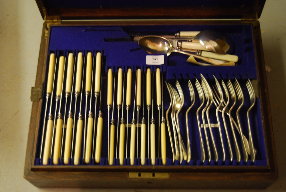 Oak cased part canteen of silver plated Old English pattern cutlery