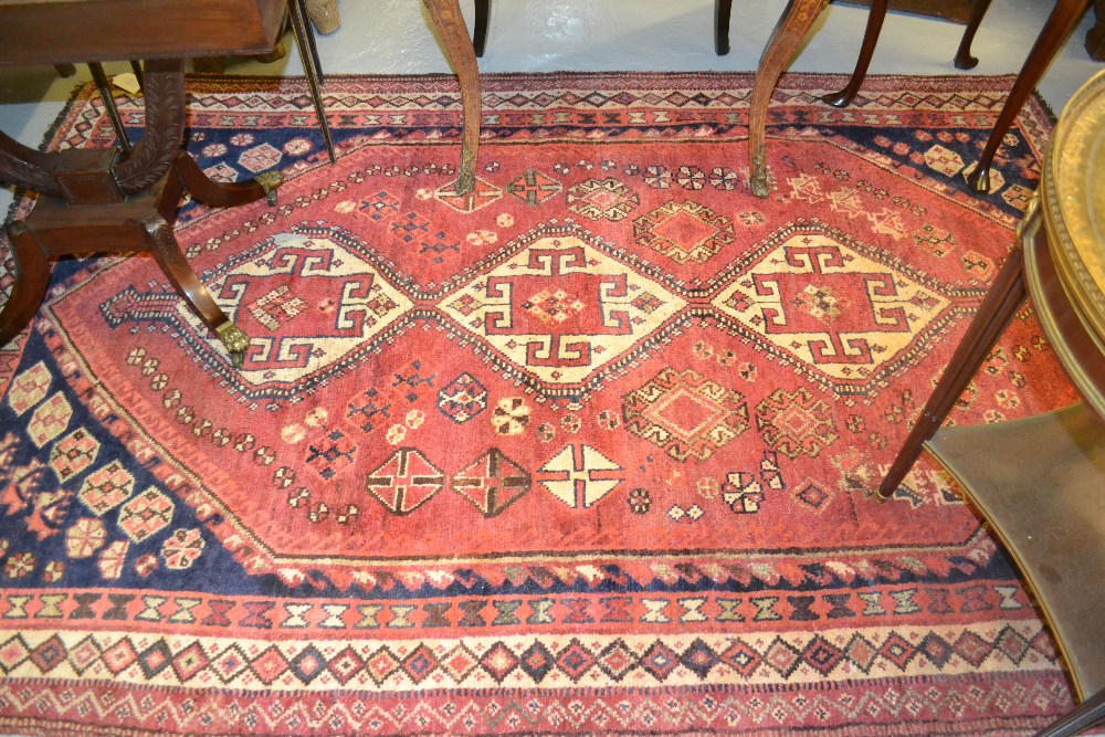 Qashqai style carpet having rose ground, 2.4m x 1.6m