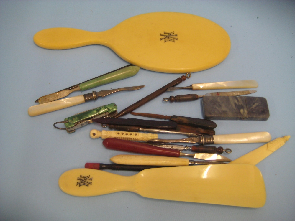 Quantity of manicure items, penknife, miscellaneous dressing table items etc including a bone