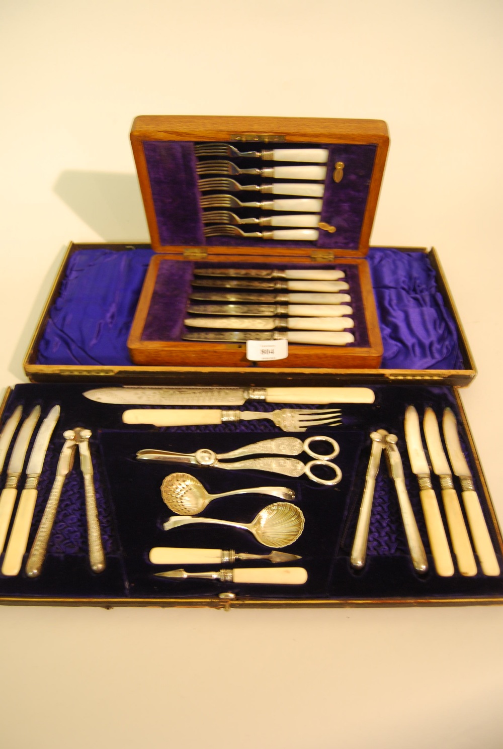 Cased set of six silver plated fruit knives and forks with mother of pearl handles together with a