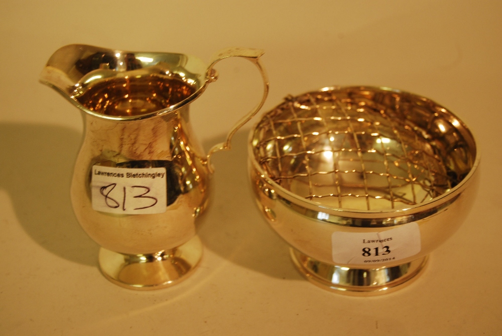 Small Birmingham silver pedestal rose bowl together with a Sheffield silver pedestal cream jug