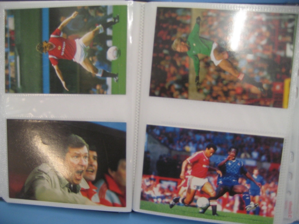Photograph album containing a quantity of Manchester United cards including player signed cards etc