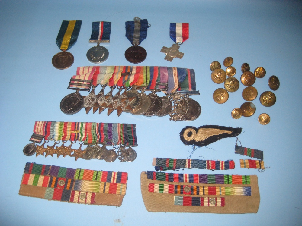 Mid 20th Century twelve medal group with miniatures and buttons, badges etc. awarded to Commander
