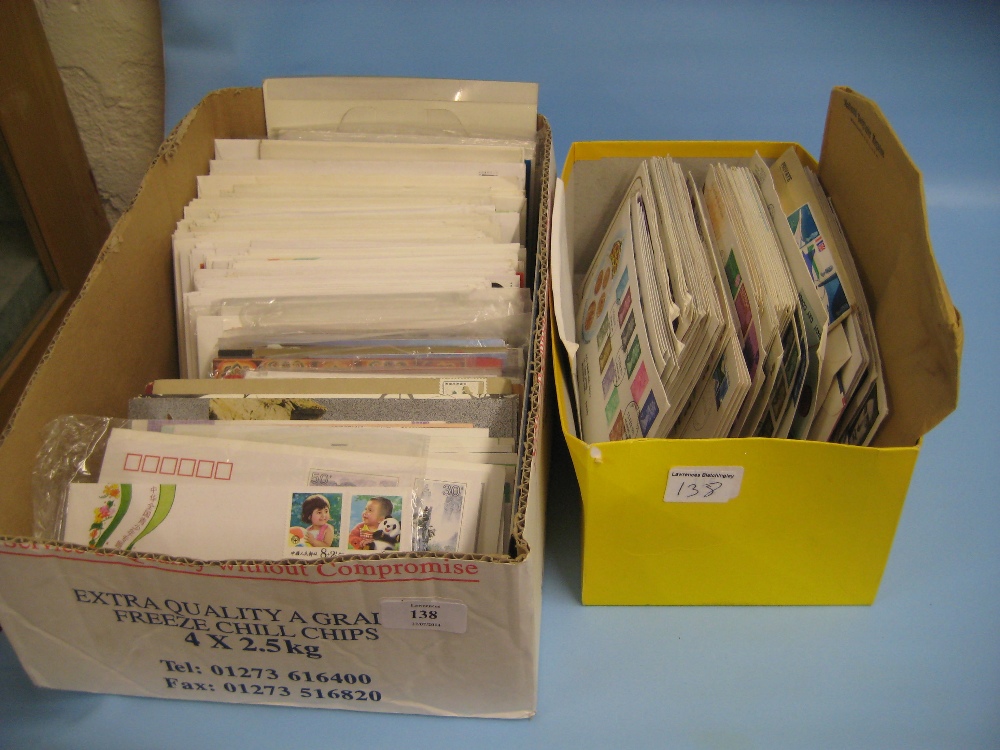 Two boxes containing a large collection of various Chinese and British First Day covers
