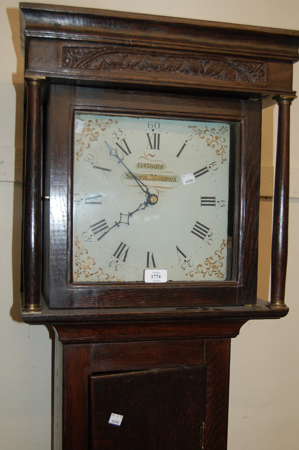George III oak longcase clock, the square hood with flanking pilasters above a rectangular panel