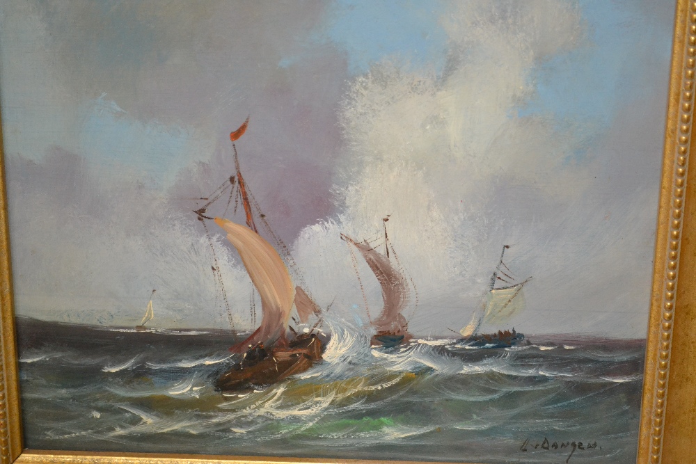 Oil on panel, fishing smacks in heavy seas, signed Dangen, 9ins x 11ins, gilt framed