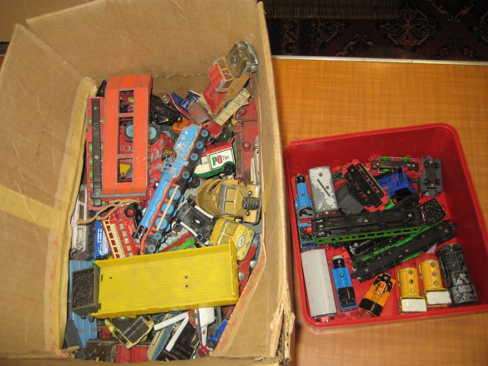 Box containing a large quantity of various childrens die-cast model vehicles including Dinky and