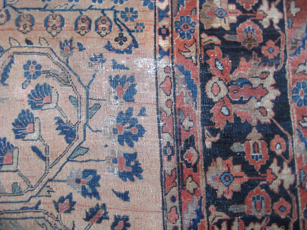 19th Century Sarouk carpet with a typical all-over floral design on a brick red field with multiple - Image 3 of 7