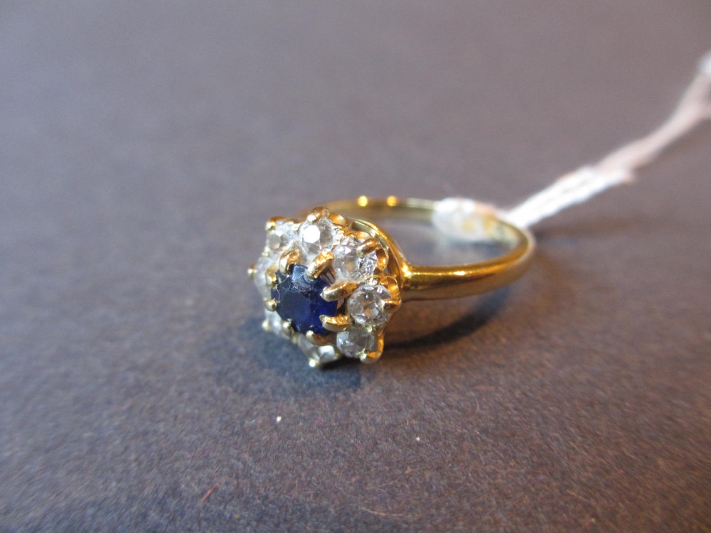 18ct Gold sapphire and diamond cluster ring