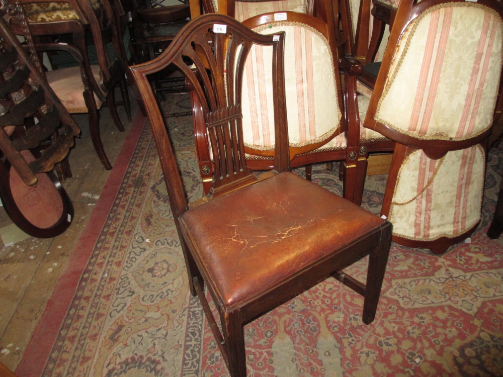 Two 19th Century mahogany pierced splat back dining chairs with square reeded tapering front