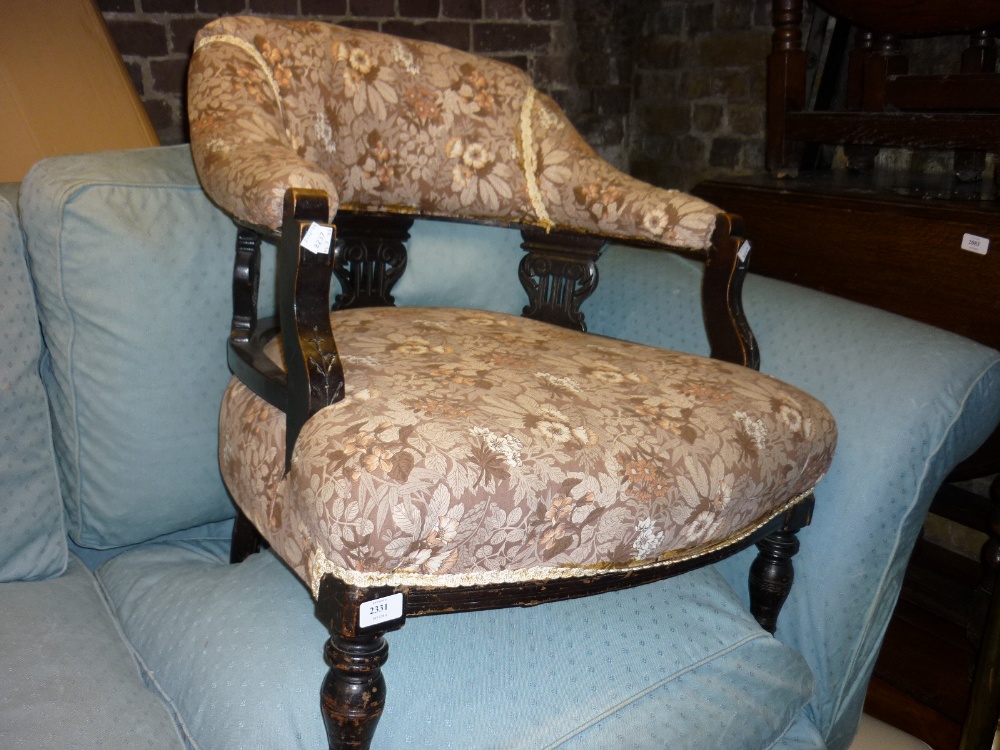 Edwardian tub shaped drawing room chair, two Edwardian elbow chairs and two Lloyd Loom style chairs