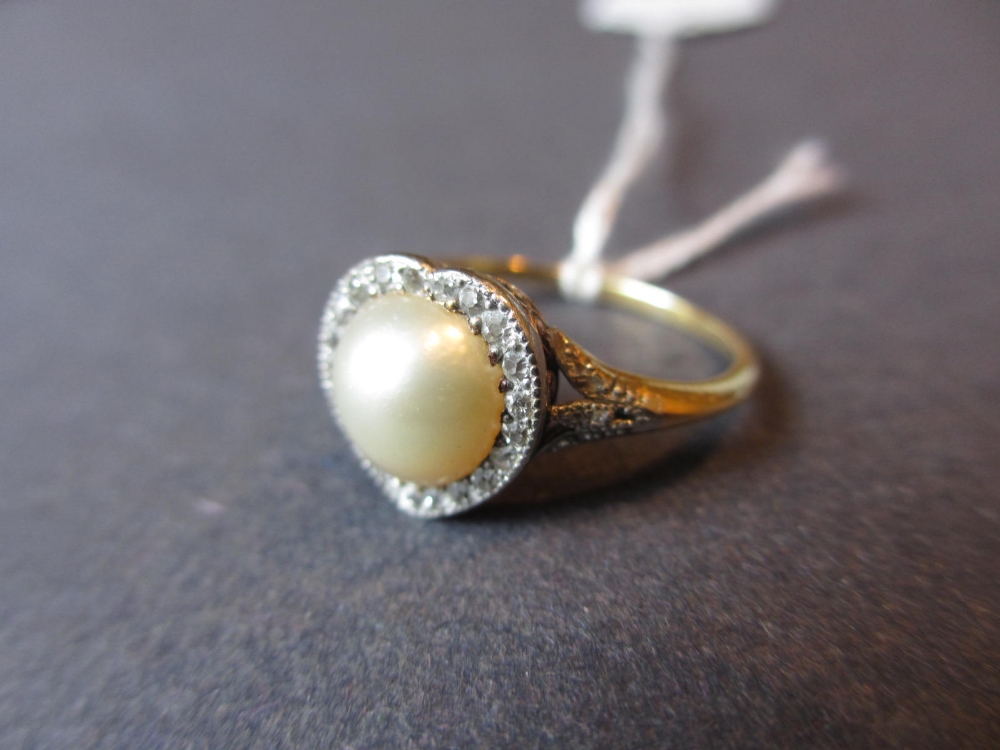 Edwardian dress ring set single large split pearl in a heart shaped diamond surround