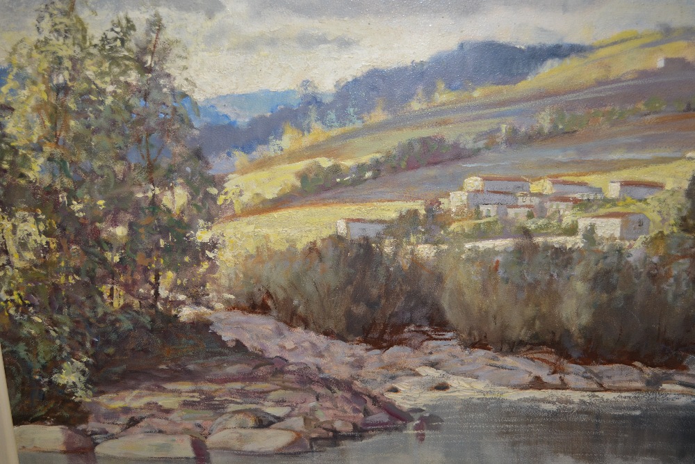 Rob Franken, 20th Century oil, view of a hillside town and river, together with a pastel mountain